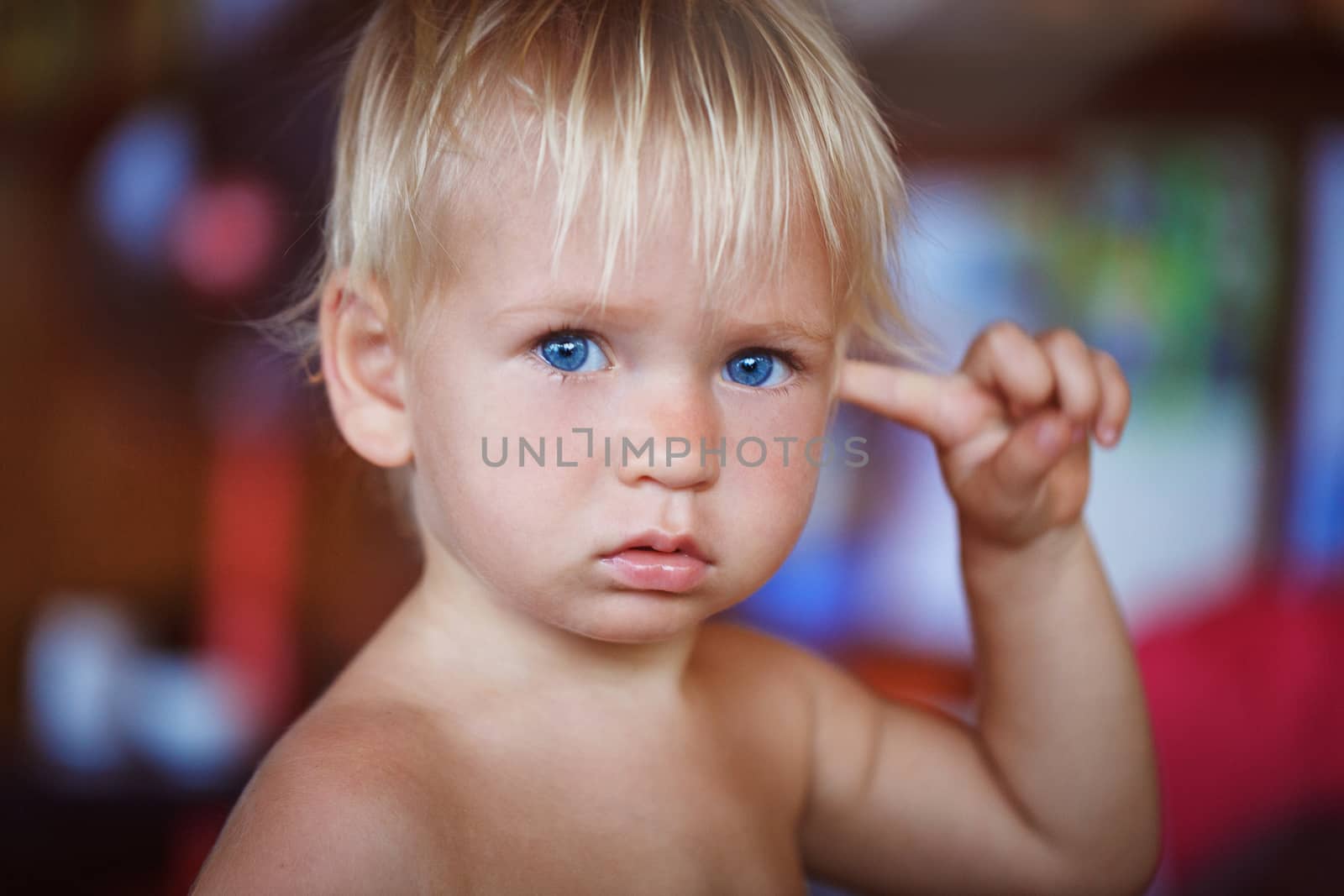 beauty blonde young boy with blue eyes in thailand