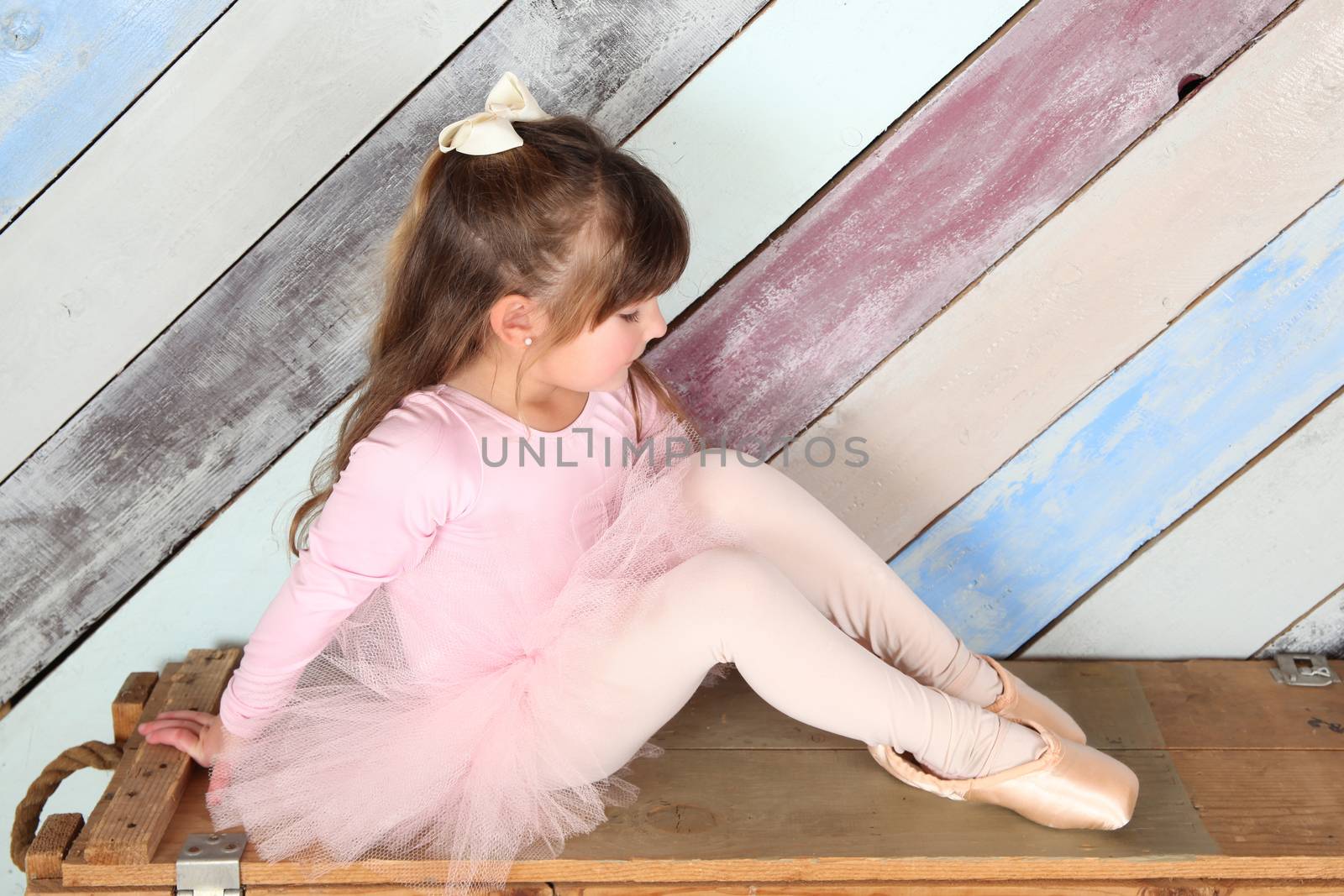 Little girl dreaming of being a ballerina