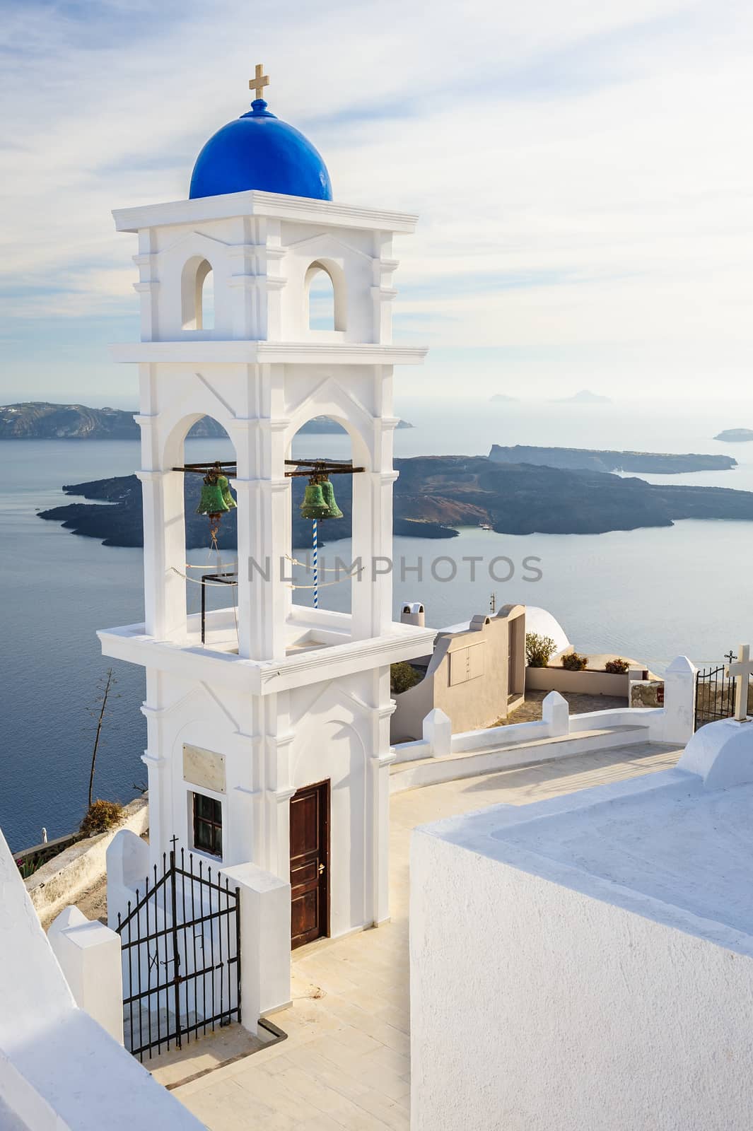 Blue and white orthodox church bell tower. Firostefani, Santorini Greece. Copyspace