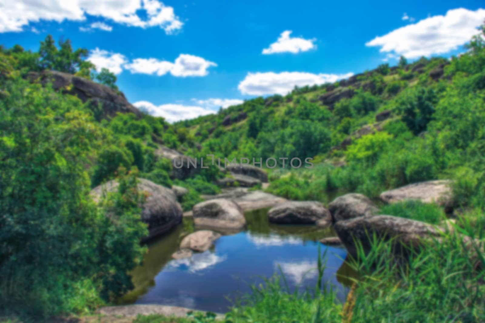 canyon landscape mountain river rocks green Summertime soft focus blur for background blurred