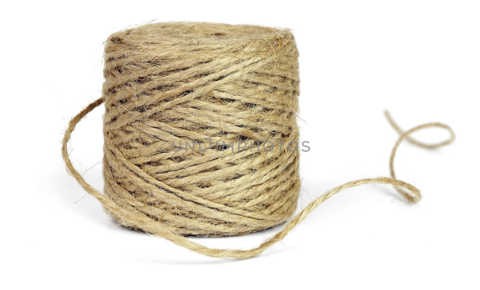 Skein of jute rope for packing, isolated on a white background.