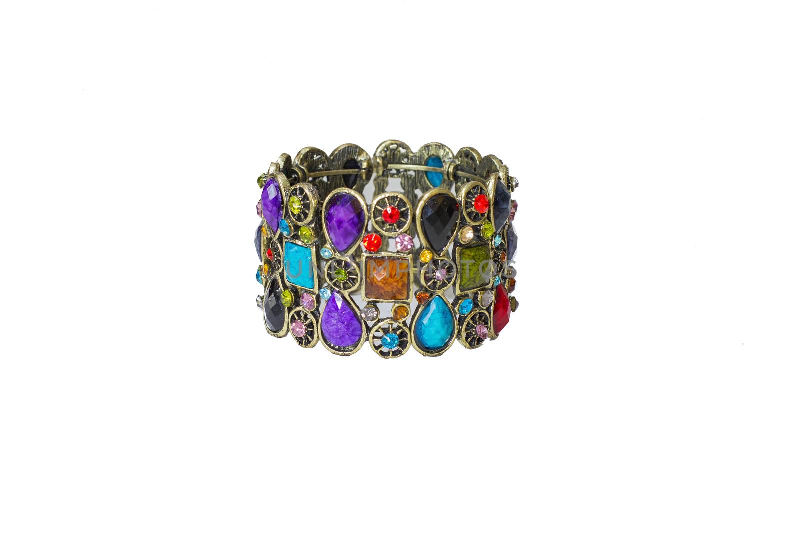 metal bracelet encrusted with colored stones, fashion jewelry in oriental style