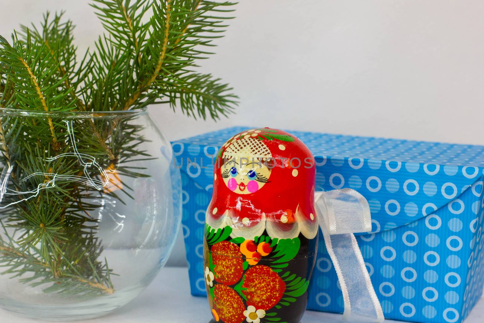Russian Christmas matryoshka  doll new year pine branches a gift in a box