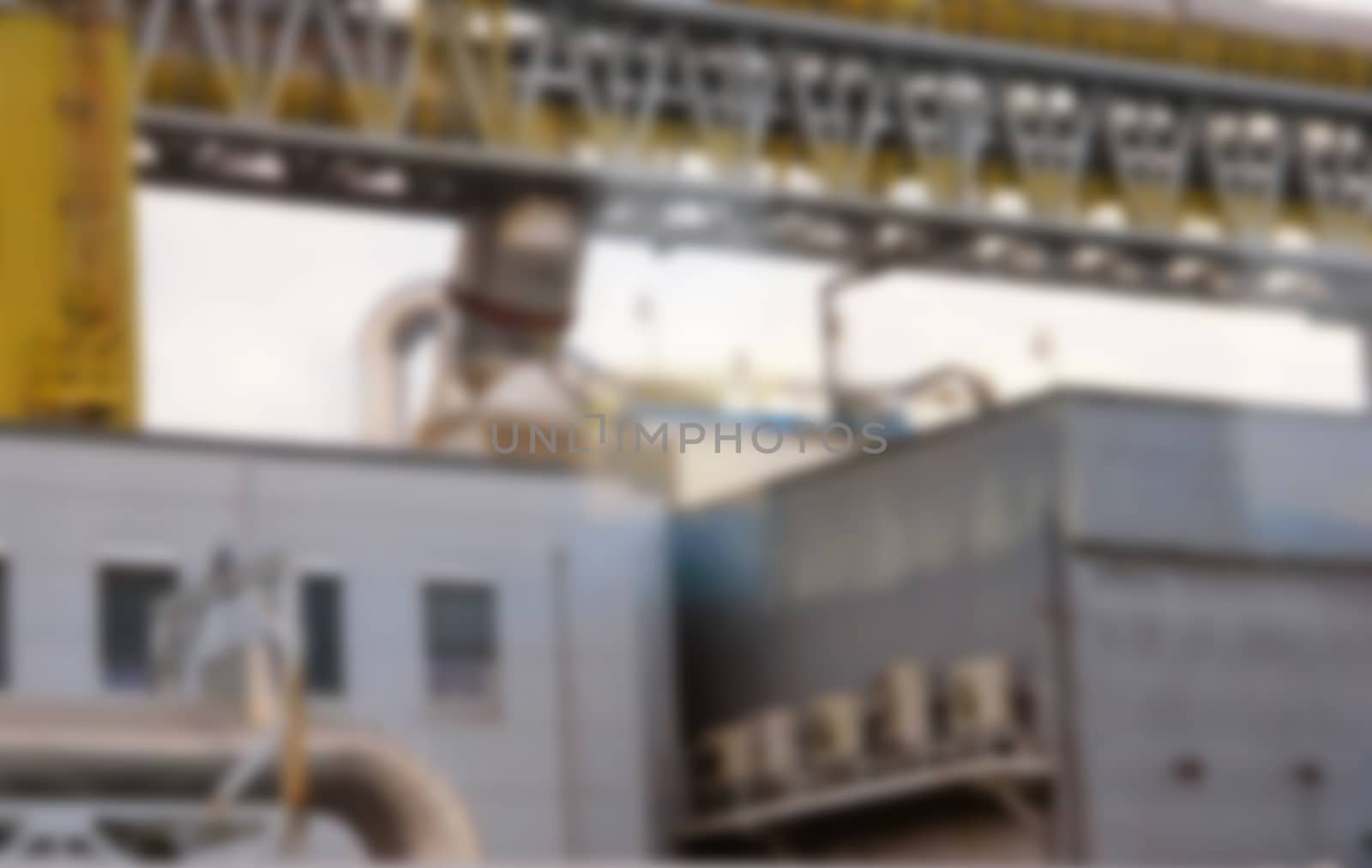Factory production area, pipes and tanks, industrial zone in the oil and construction plant, background, blurred