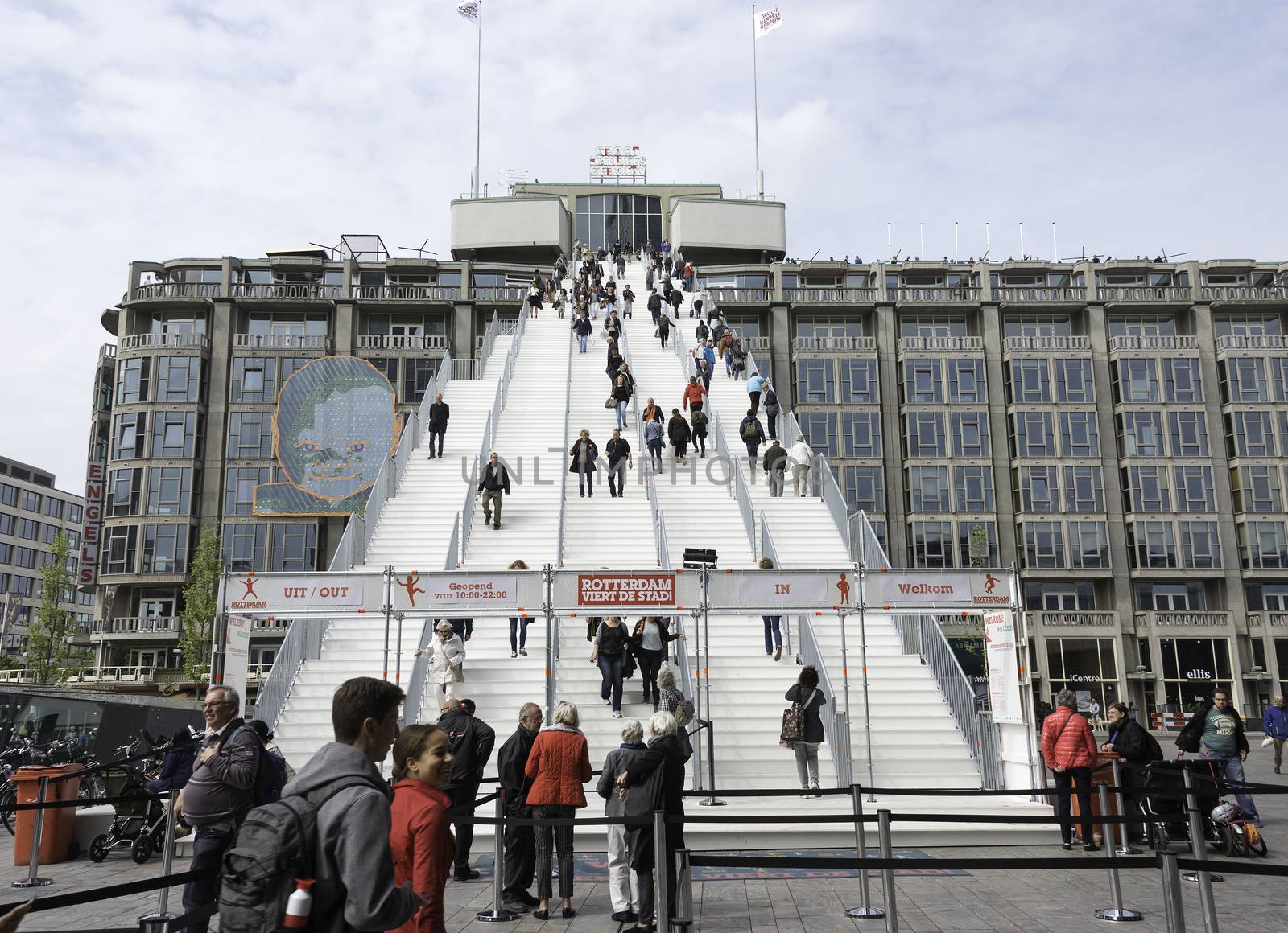 ROTTERDAM,HOLLAND-MAY 18, Unidentified  people at a giant staircase with 180 steps from the station to the Groothandelsgebouw on May 18 2016 in Rottrerdam, a nod to 75 years rebuilding the city