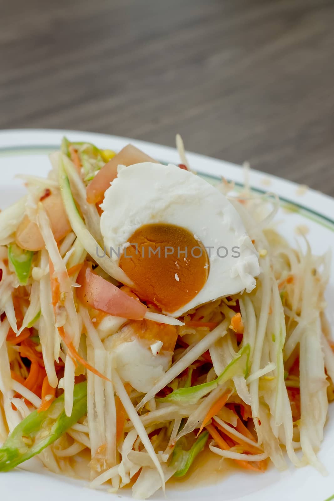Famous Thai food, Papaya salad with salted egg or what we called "Somtum Kai-Kem" in Thai Language