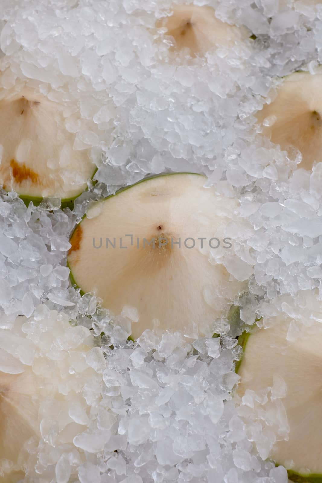 Cold Green coconuts in ice tank ready to drink