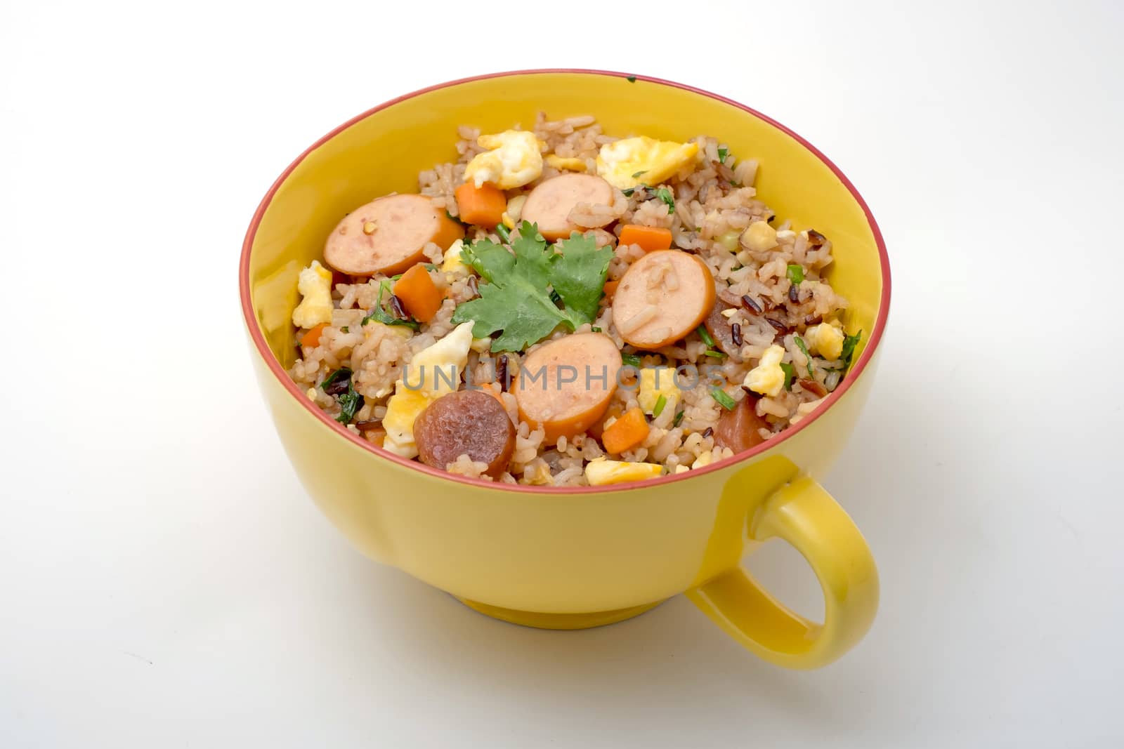 Fried rice with sausage and vegetables on white background by art9858