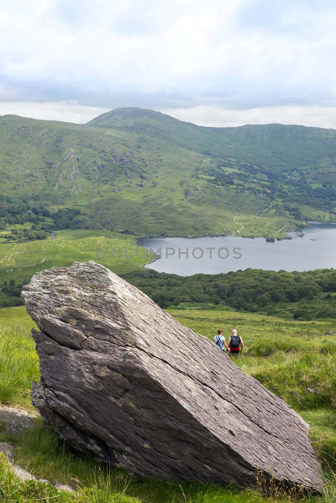 big rock with hikers by morrbyte