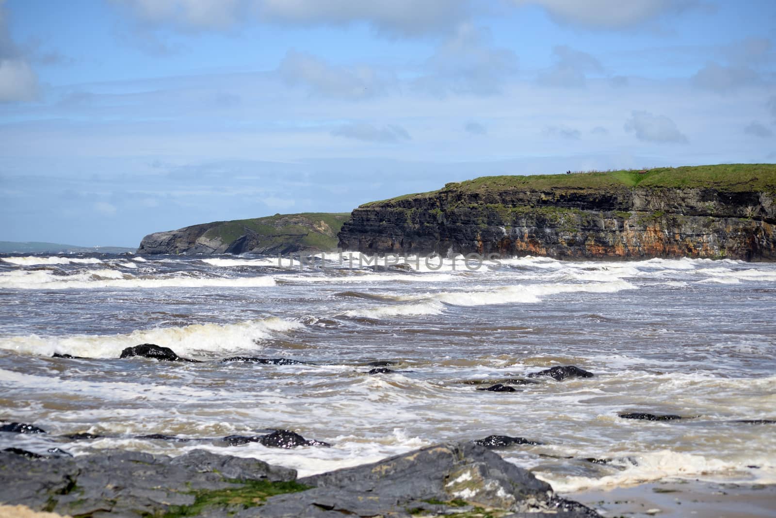 waves and cliffs on the wild atlantic way in Ballybunion county Kerry Ireland