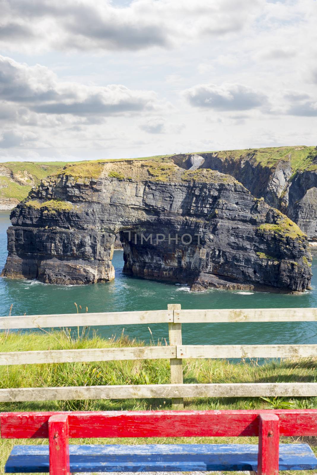 red and blue seat view of the virgin rock ballybunion on the wild atlantic way