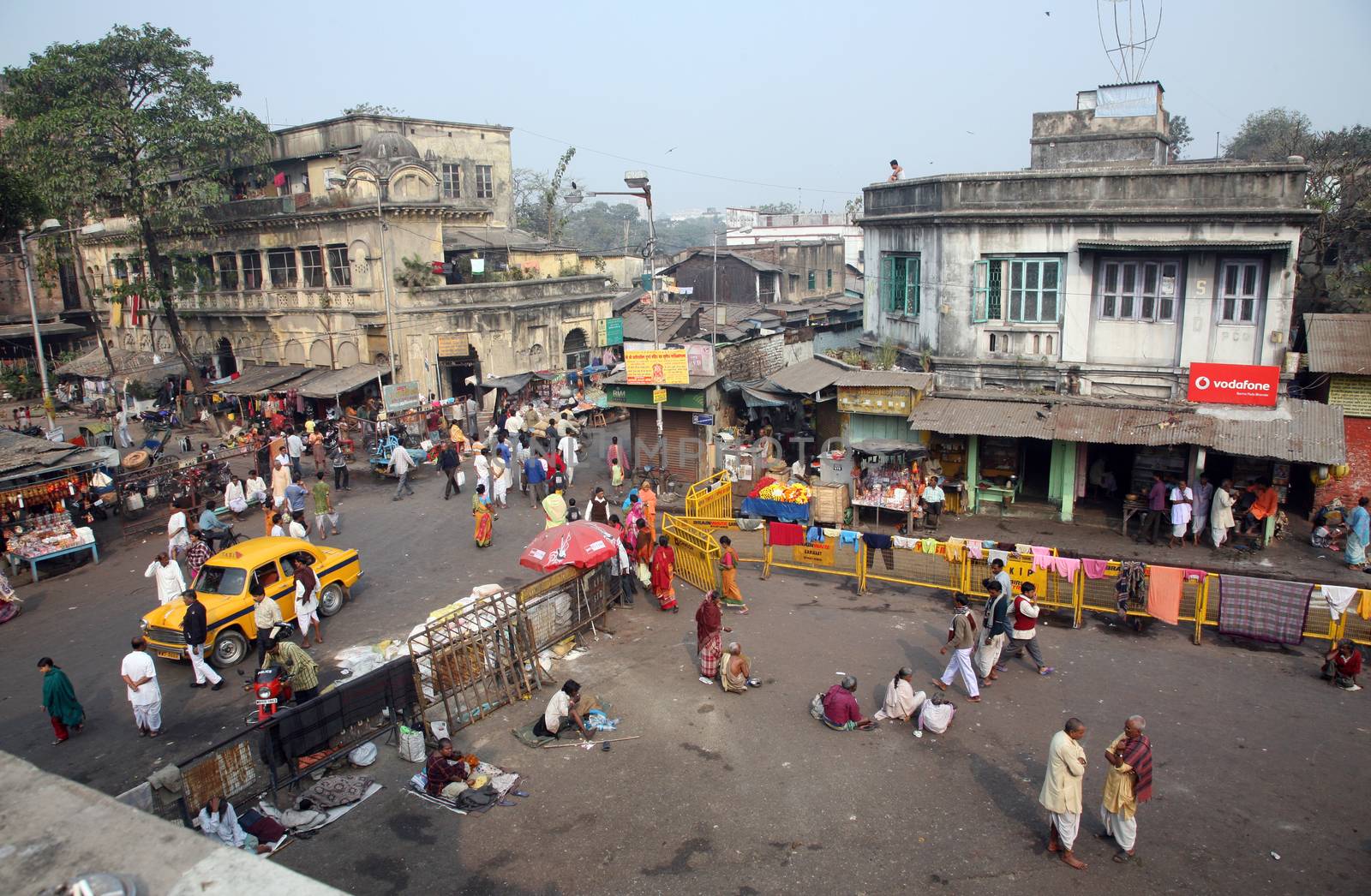Tourists and visitors of famous Kalighat Kali Temple have rest near the shrine on January 24, 2009 in Kolkata. The name Calcutta to have been derived from the word Kalighat