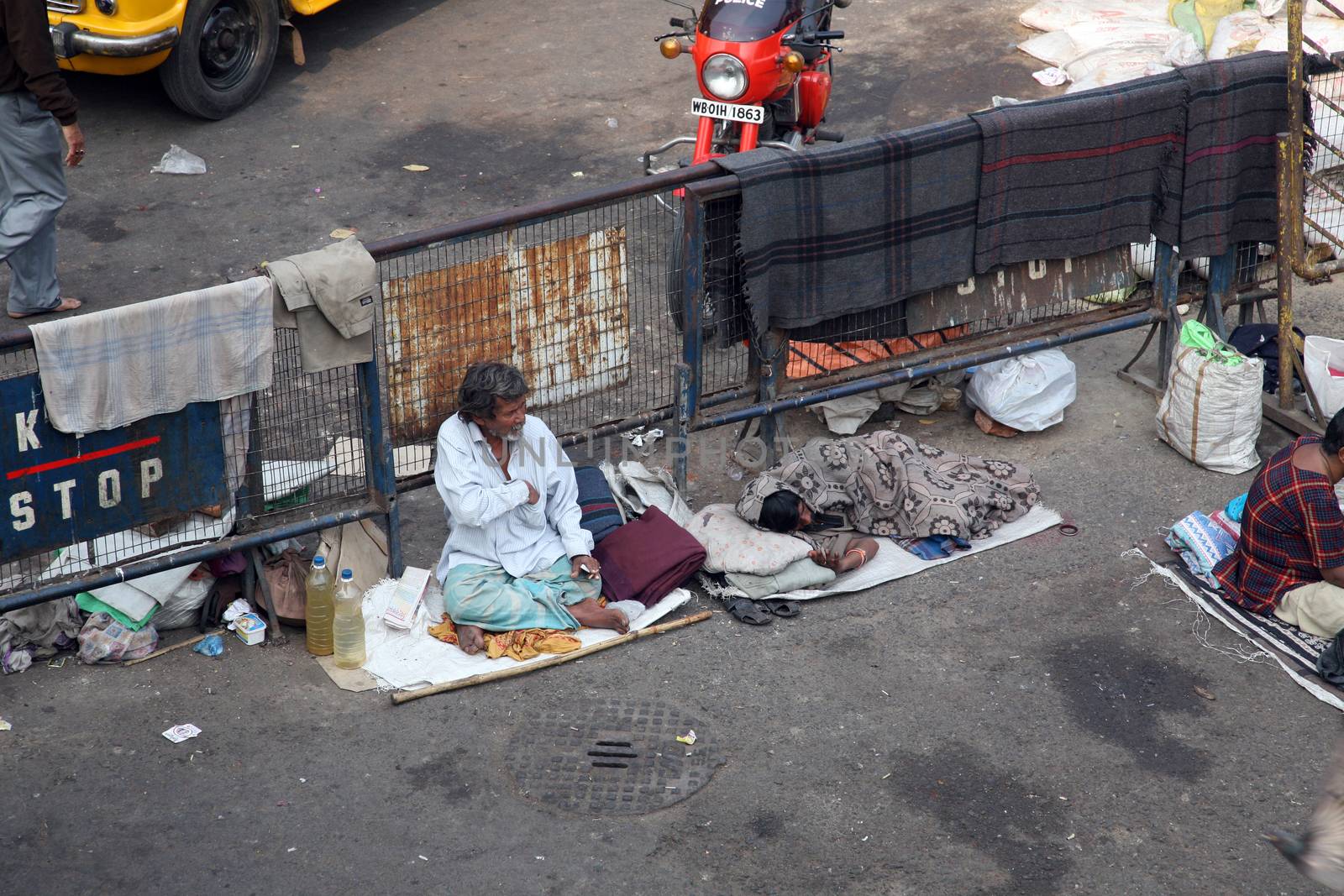 Beggars in front of Nirmal, Hriday, Home for the Sick and Dying Destitutes, one of the buildings established by the Mother Teresa and run by the Missionaries of Charity in Kolkata, India on January 24, 2009.