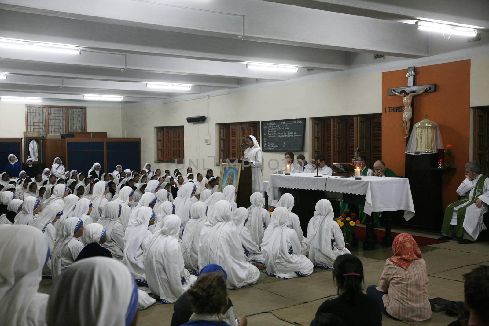 Sisters of The Missionaries of Charity of Mother Teresa at Mass in the chapel of the Mother House, Kolkata by atlas