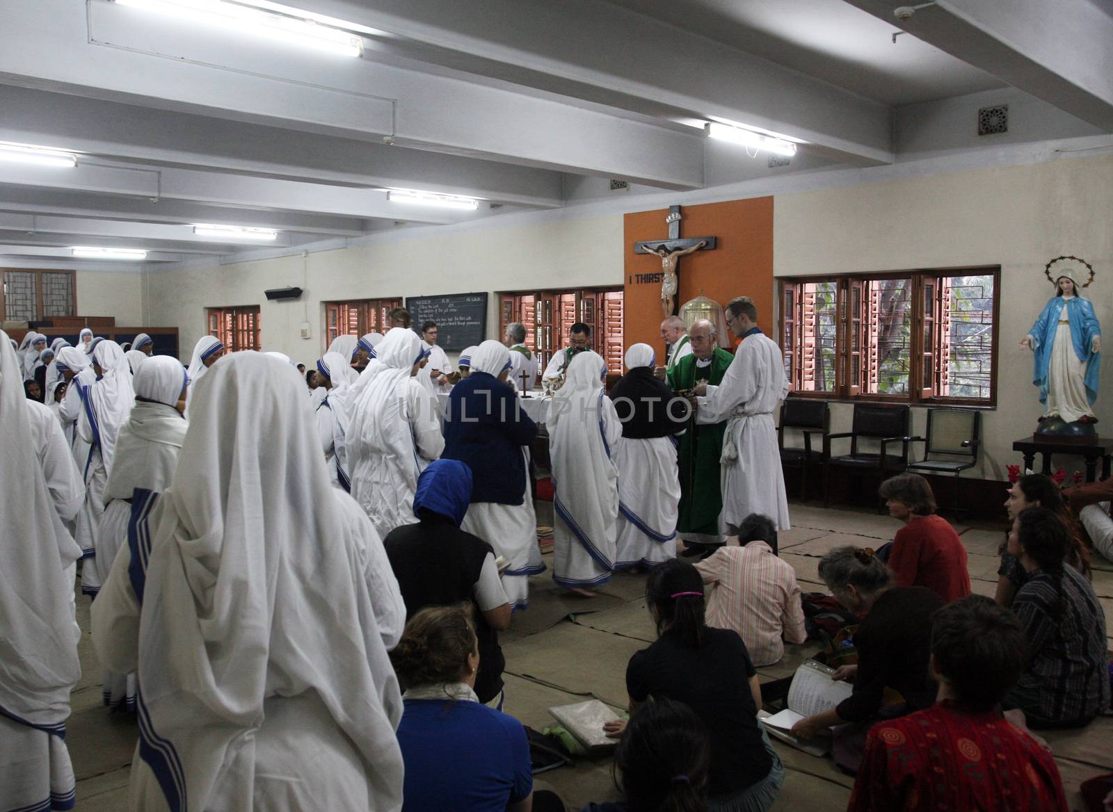 Sisters of The Missionaries of Charity of Mother Teresa at Mass in the chapel of the Mother House, Kolkata by atlas