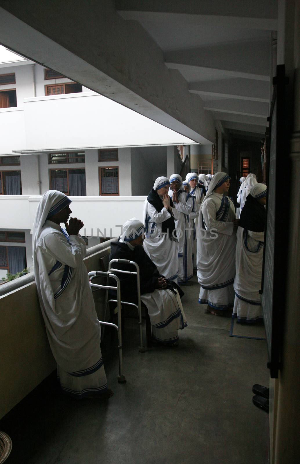 Sisters of The Missionaries of Charity of Mother Teresa at Mass in the chapel of the Mother House, Kolkata by atlas
