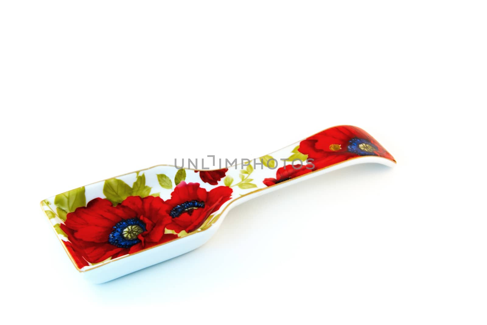 ceramic stand for spoons on a white background