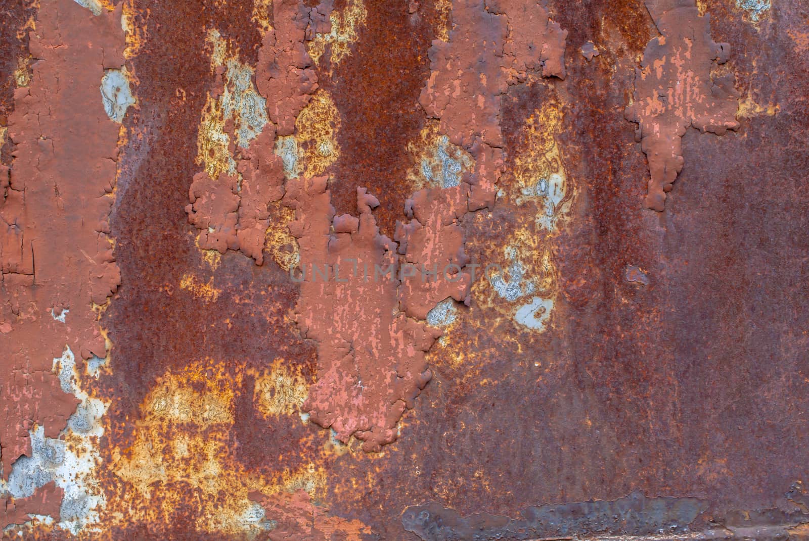 surface of rusty iron with remnants of old paint, great background or texture for your project by uvisni