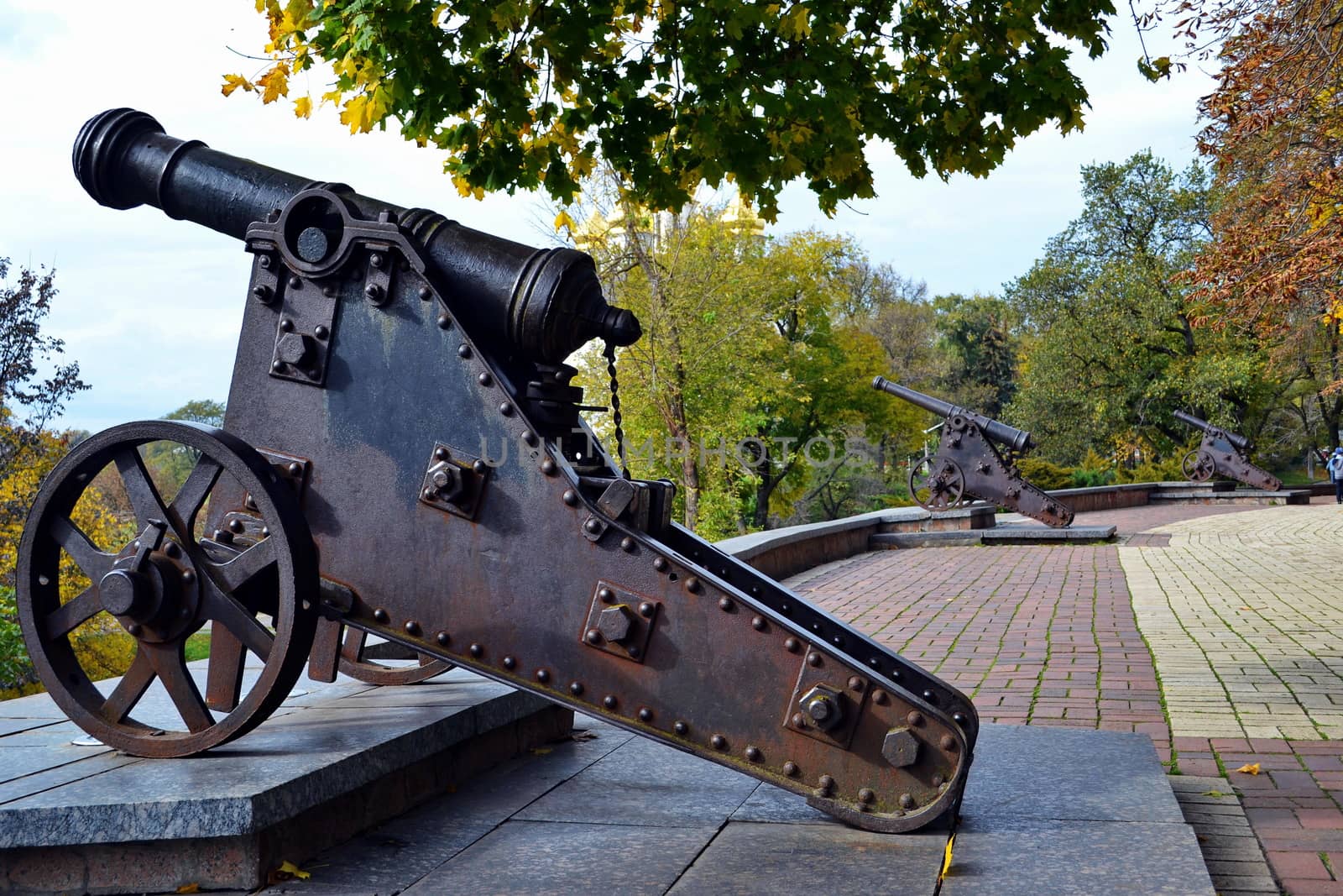 The ancient cannon in Chernigov city park early autumn