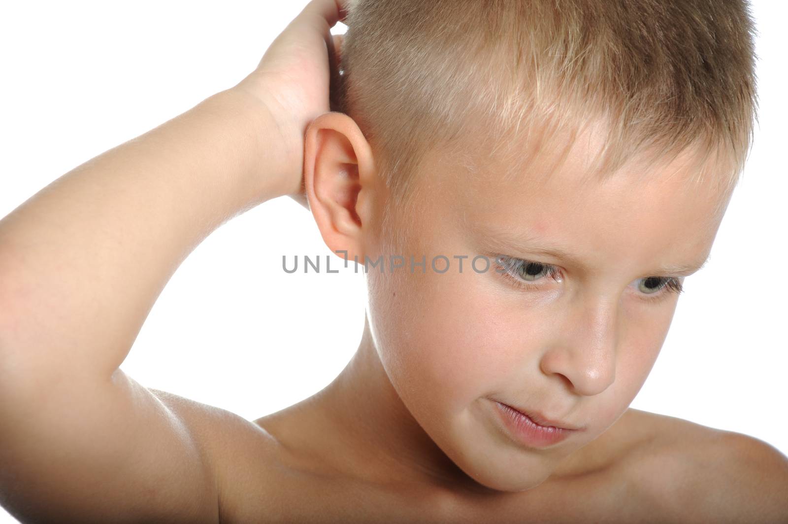 photo of young muscular posing naked torso holding raised hands and arms up isolated over white background