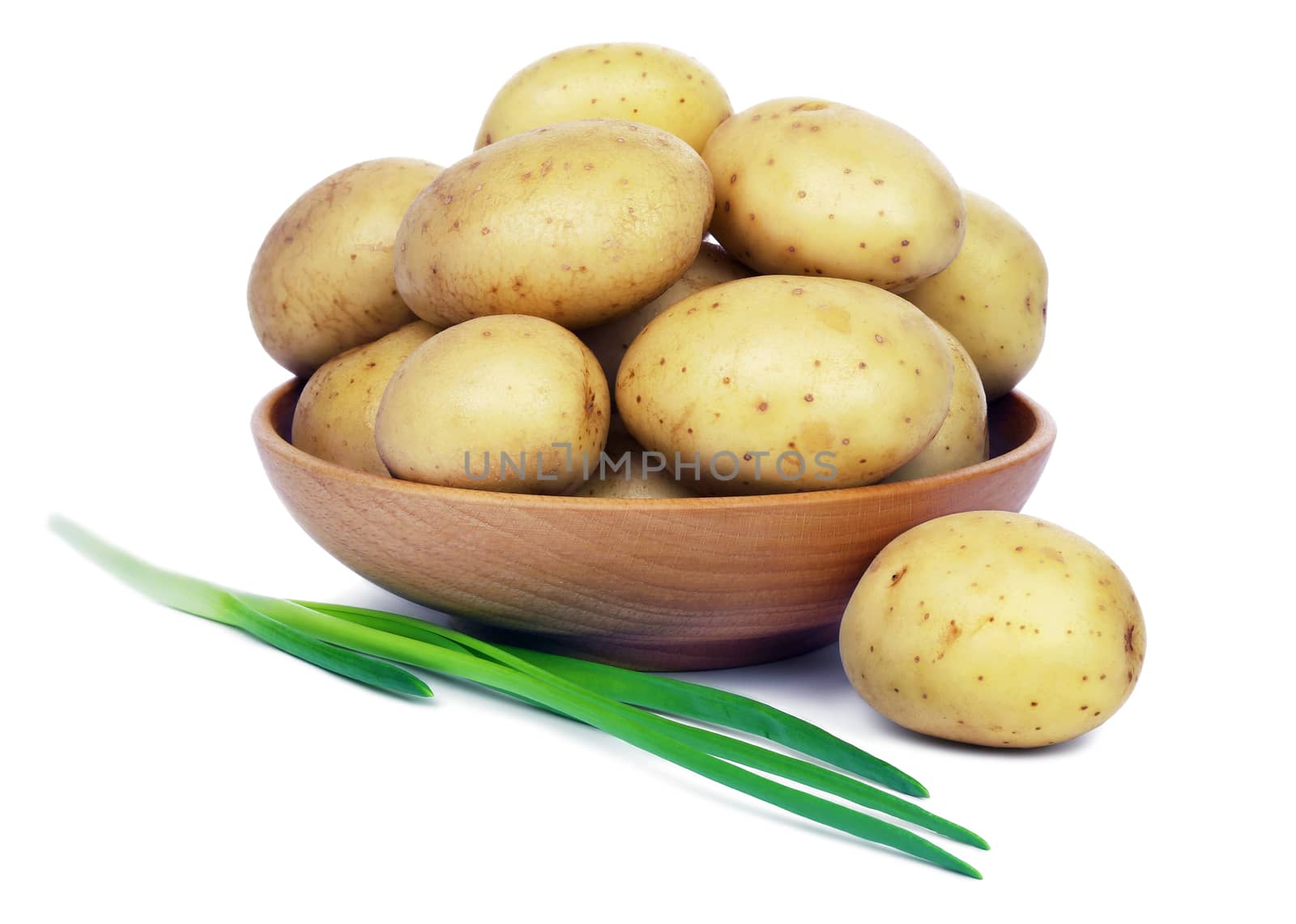 Raw potatoes and green onions by leventina
