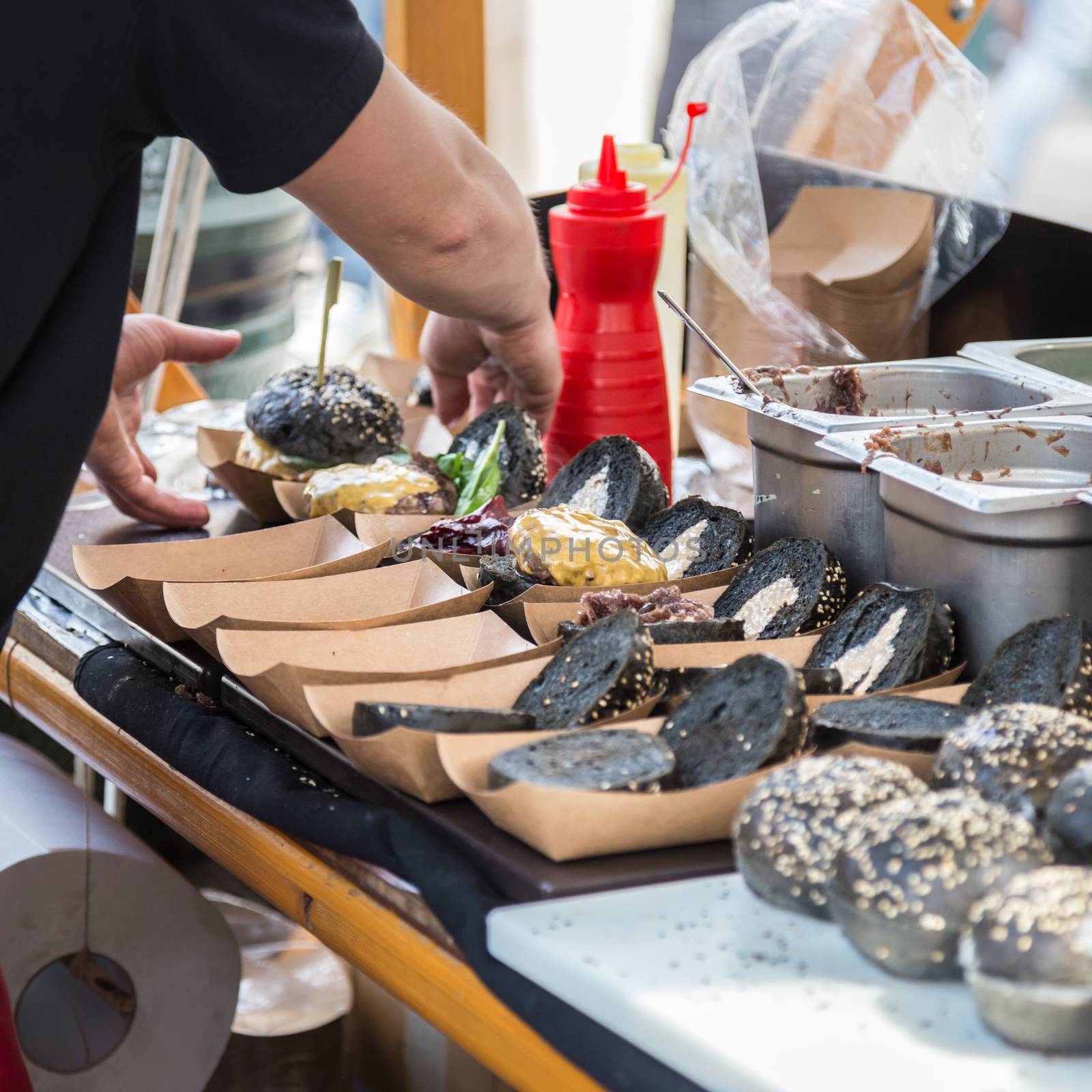 Burgers ready to serve on food stall. by kasto