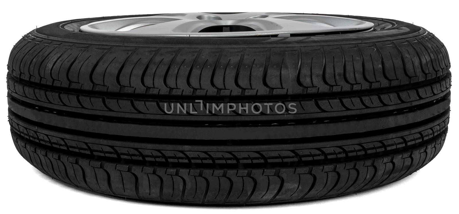 Car tire, isolated on white background. Perspective view