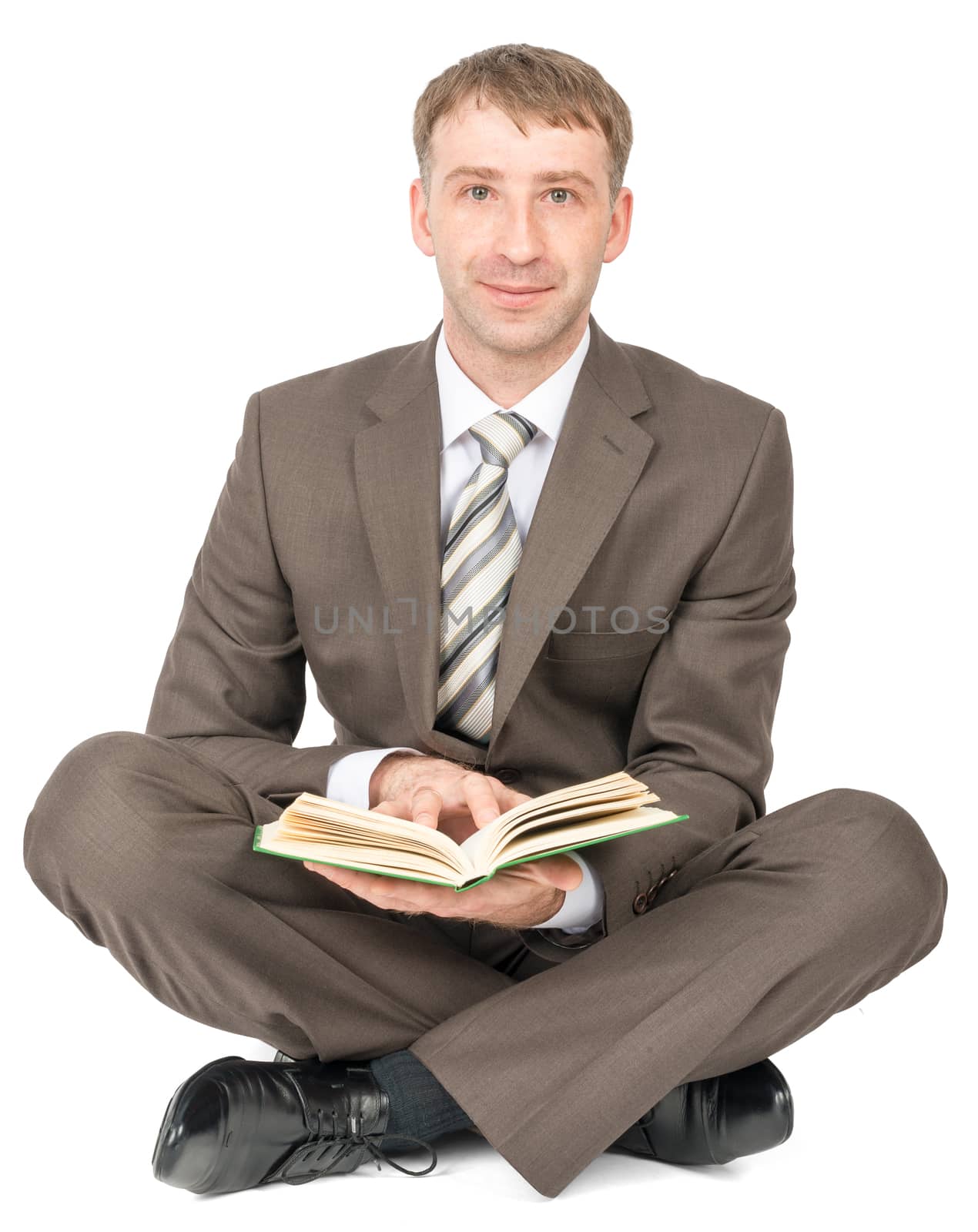 Man sitting with book by cherezoff