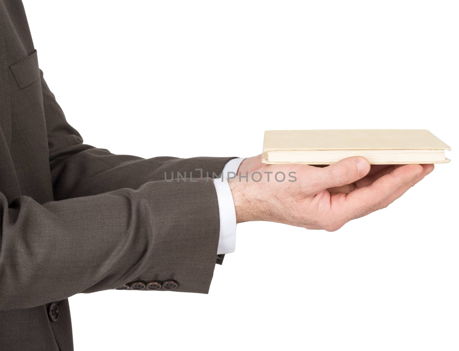 Business man hands holding book isolated on white background, closeup