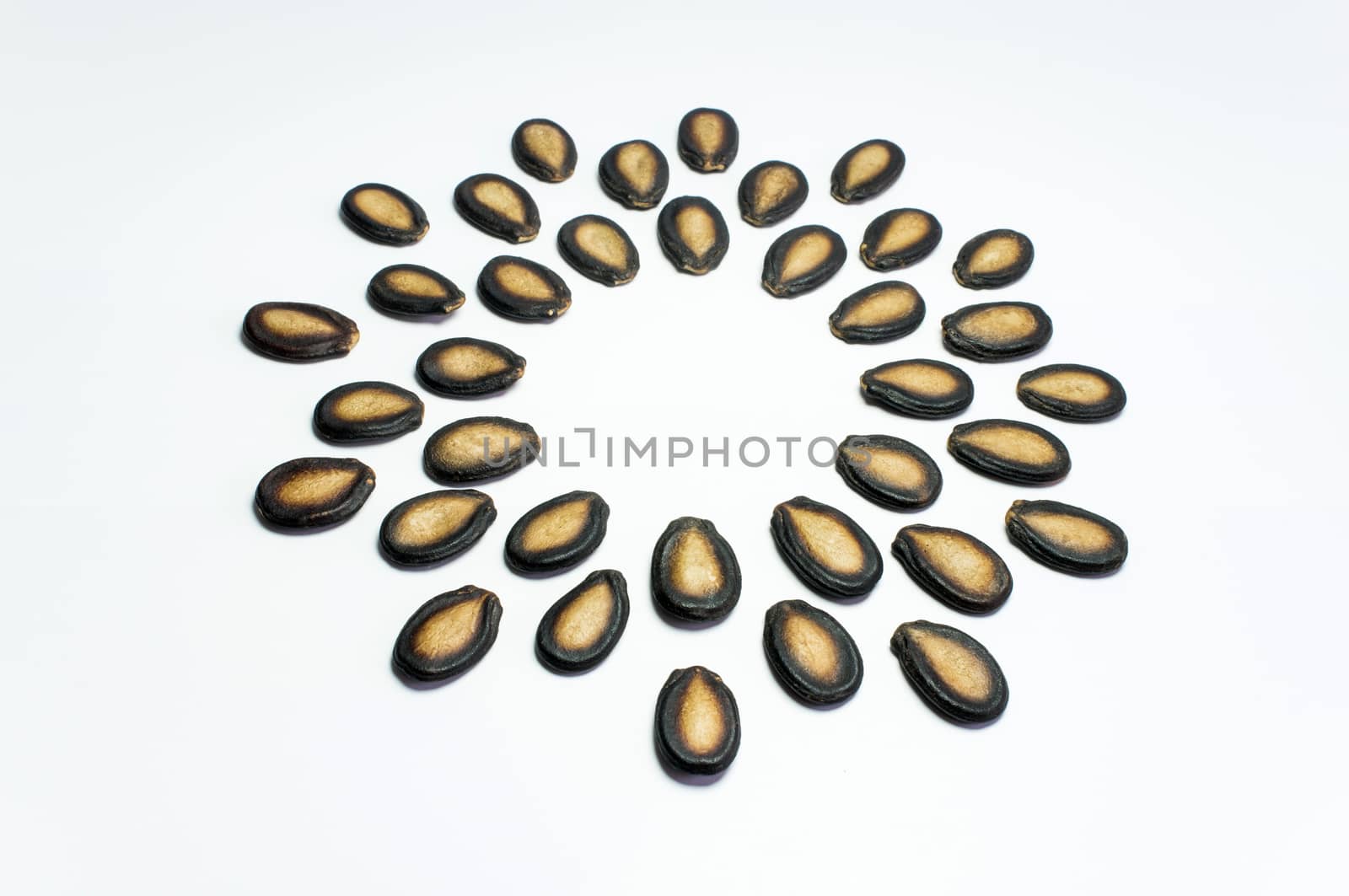 Watermelon seeds on white background