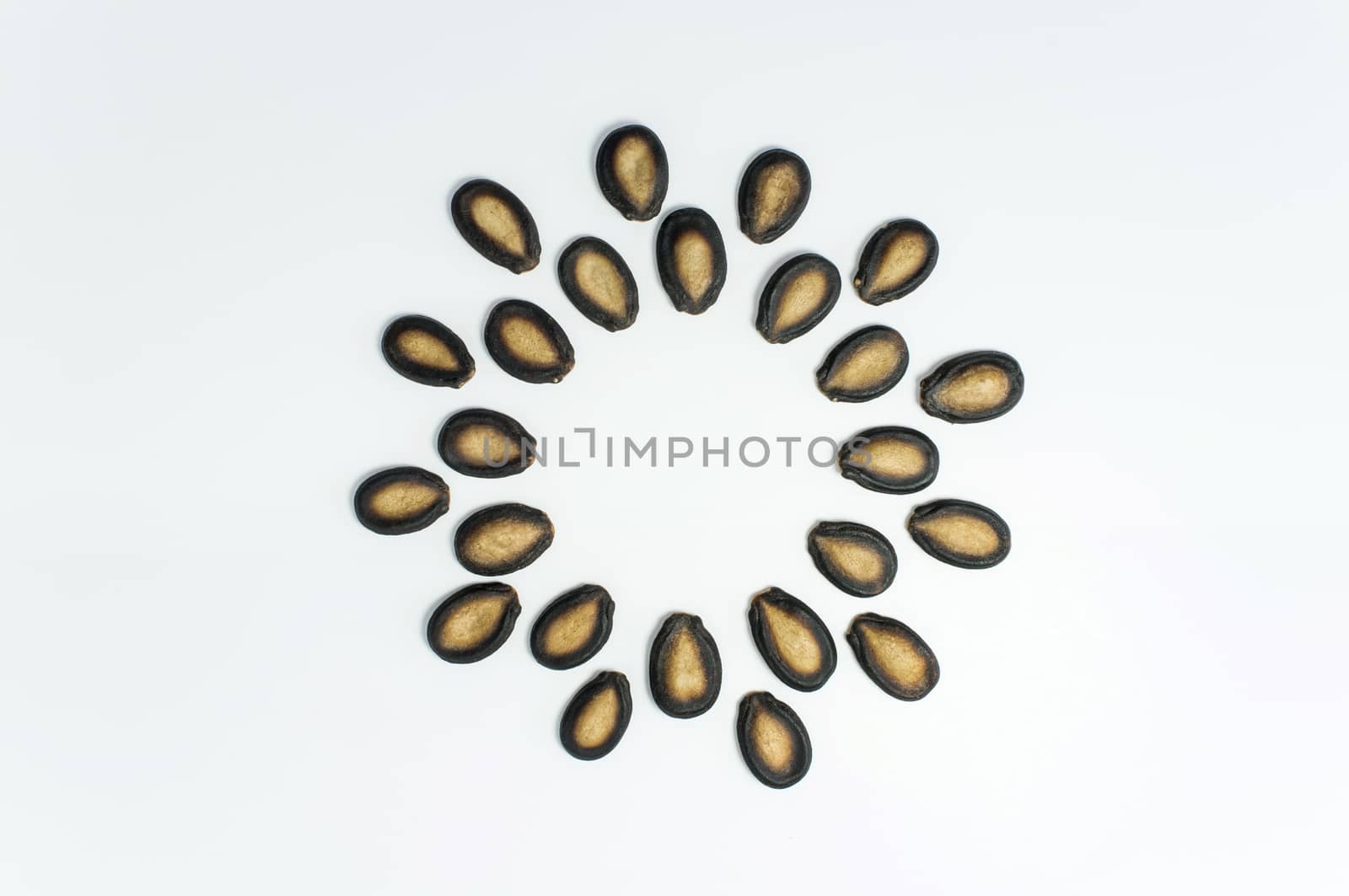 Watermelon seeds on white background