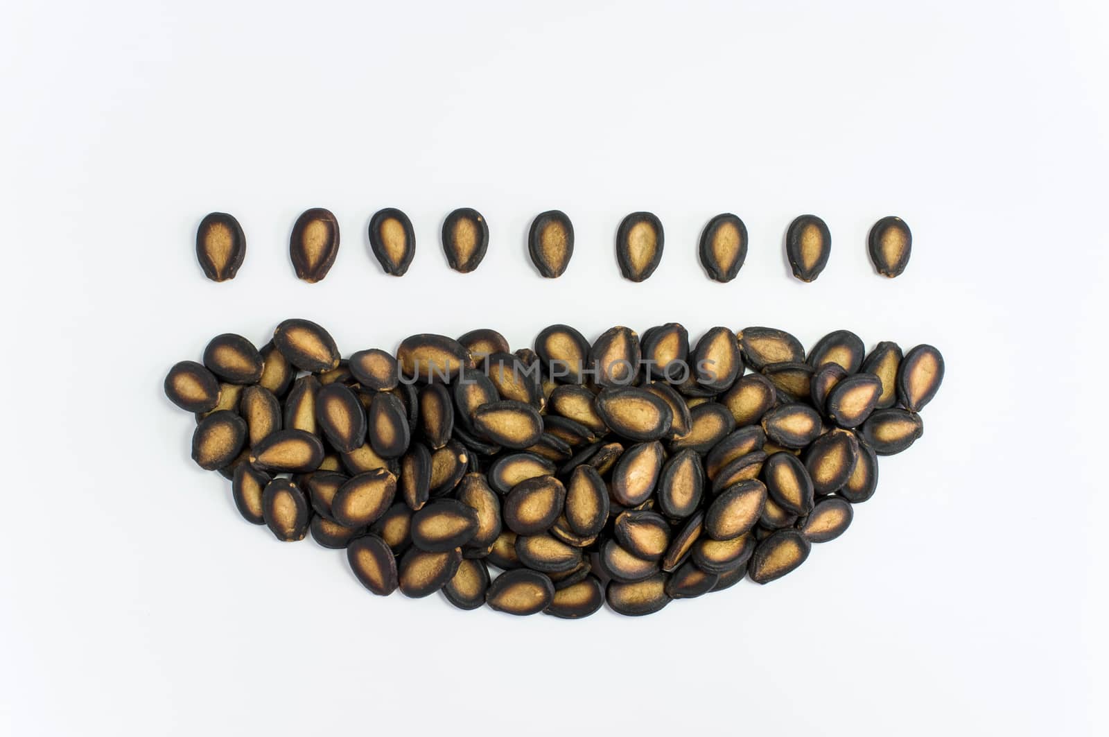 Watermelon seeds on white background