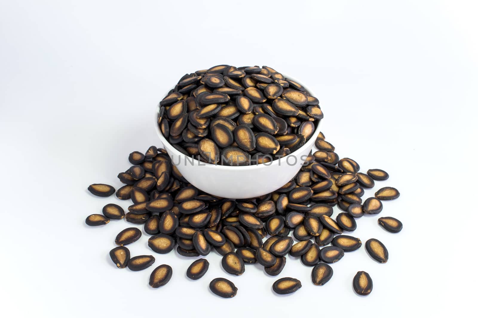 Watermelon seeds in white bowl