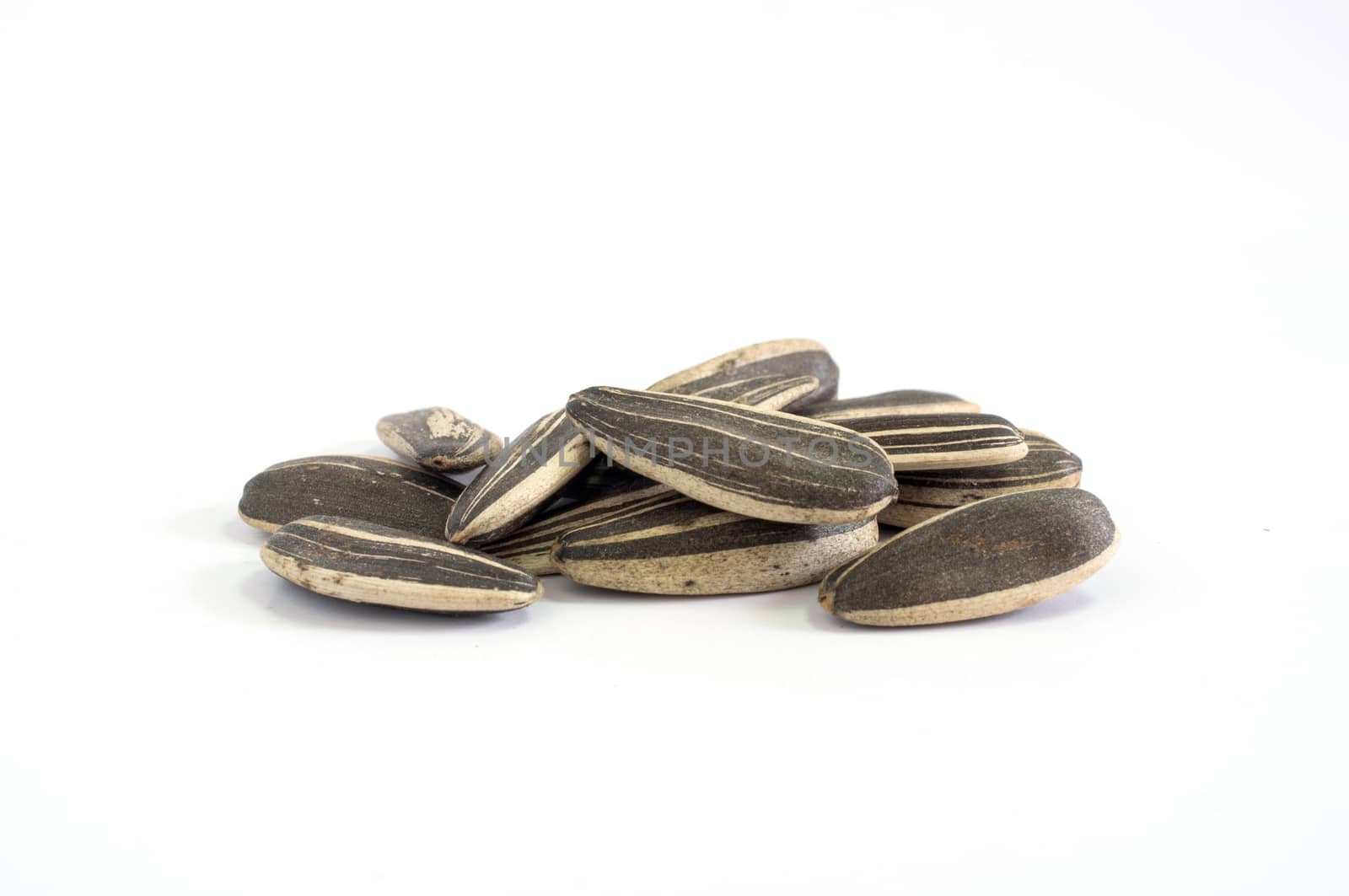 Close up Sunflower seeds on white background.