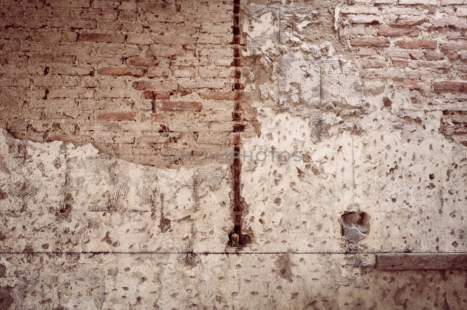 old cracked brick wall texture background. Vintage effect.