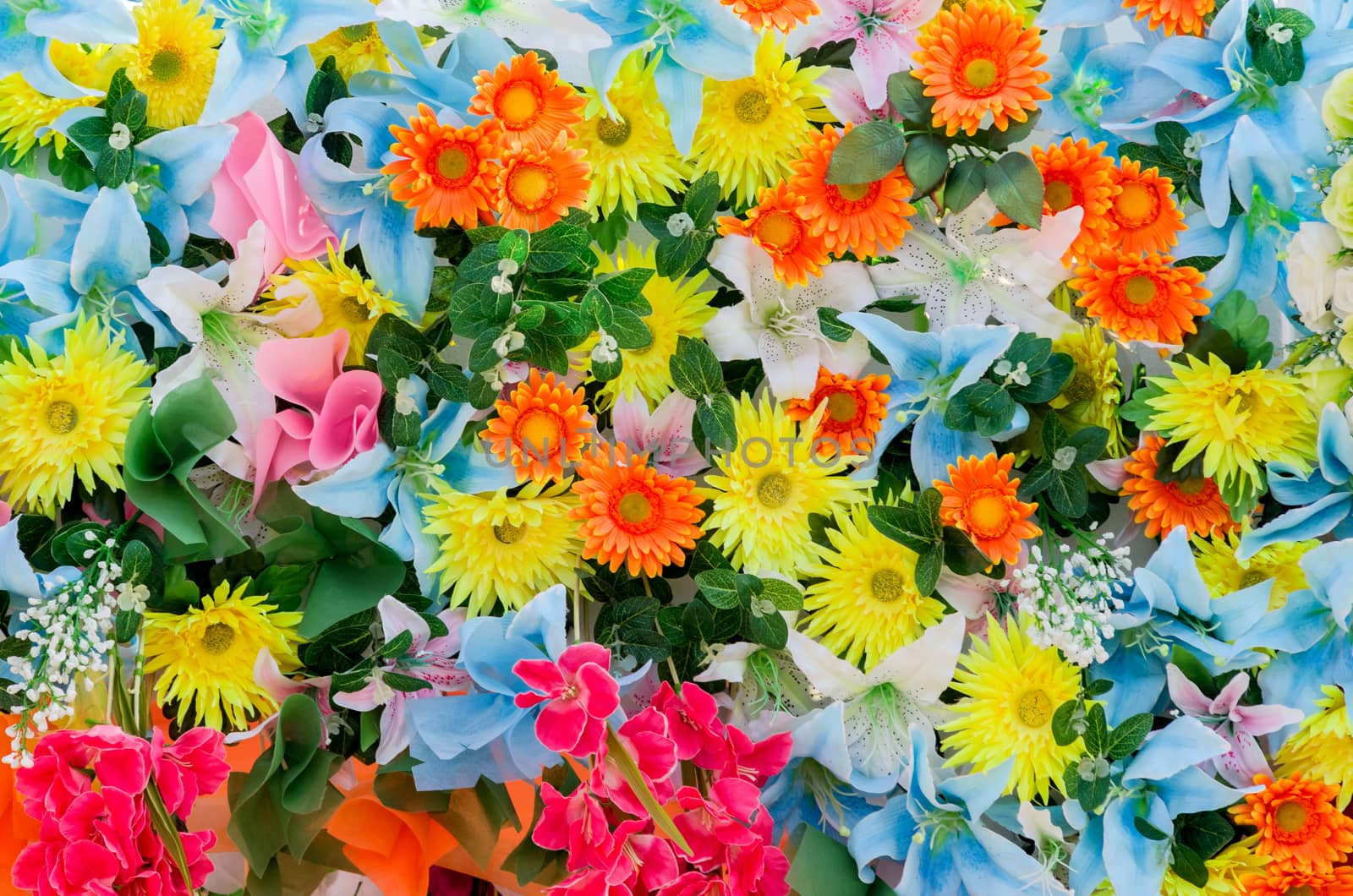 Colorful flowers background pattern made from cloth and plastic