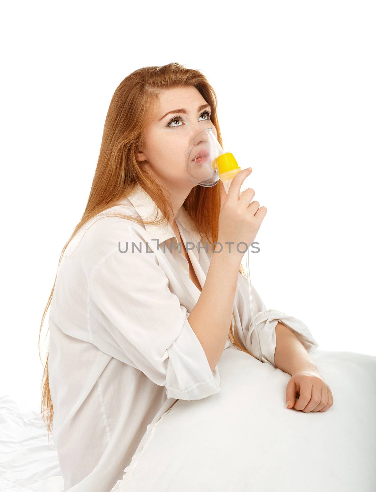 Sick beautiful young woman makes himself inhalation mask for breathing at home Isolated on white background