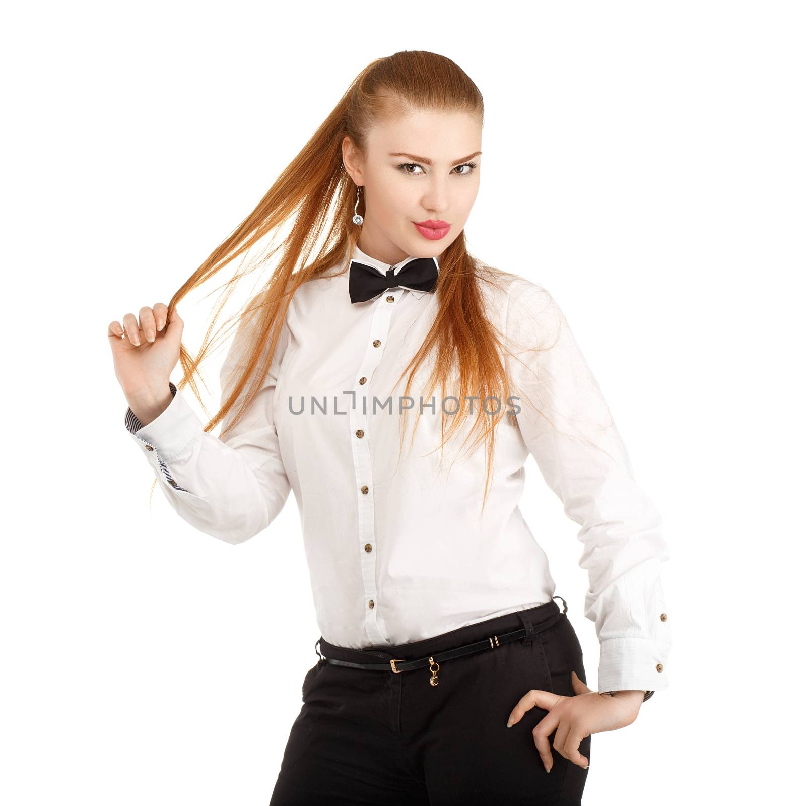 Portrait of beautiful young woman in strict clothing with bow tie isolated on white background