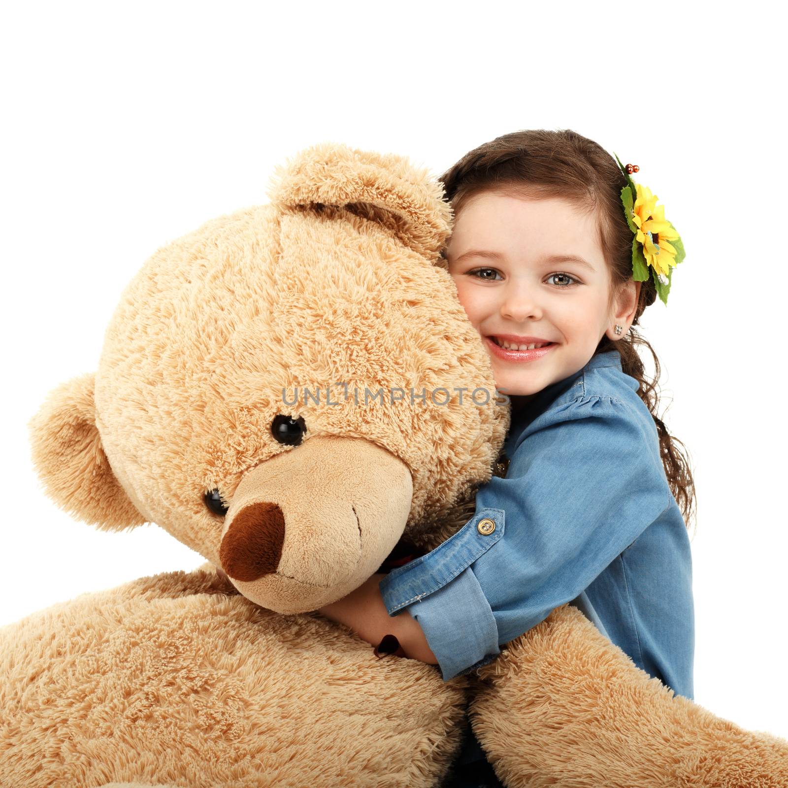 Little girl with big teddy bear having fun laughing Isolated on white background