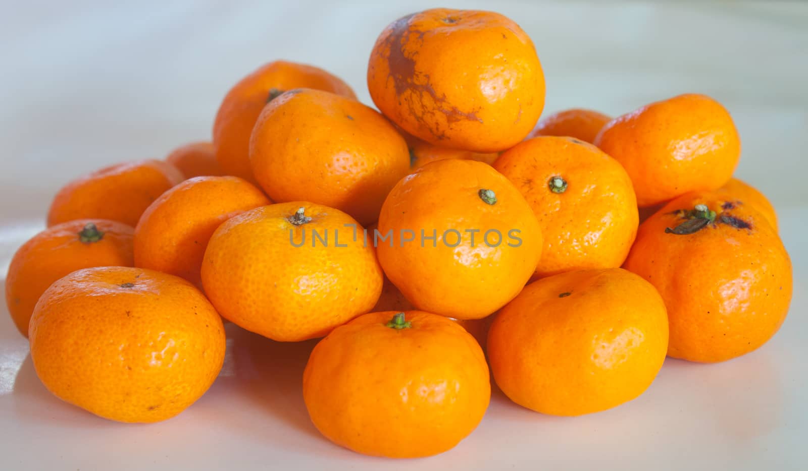 Small oranges grown in Thailand.