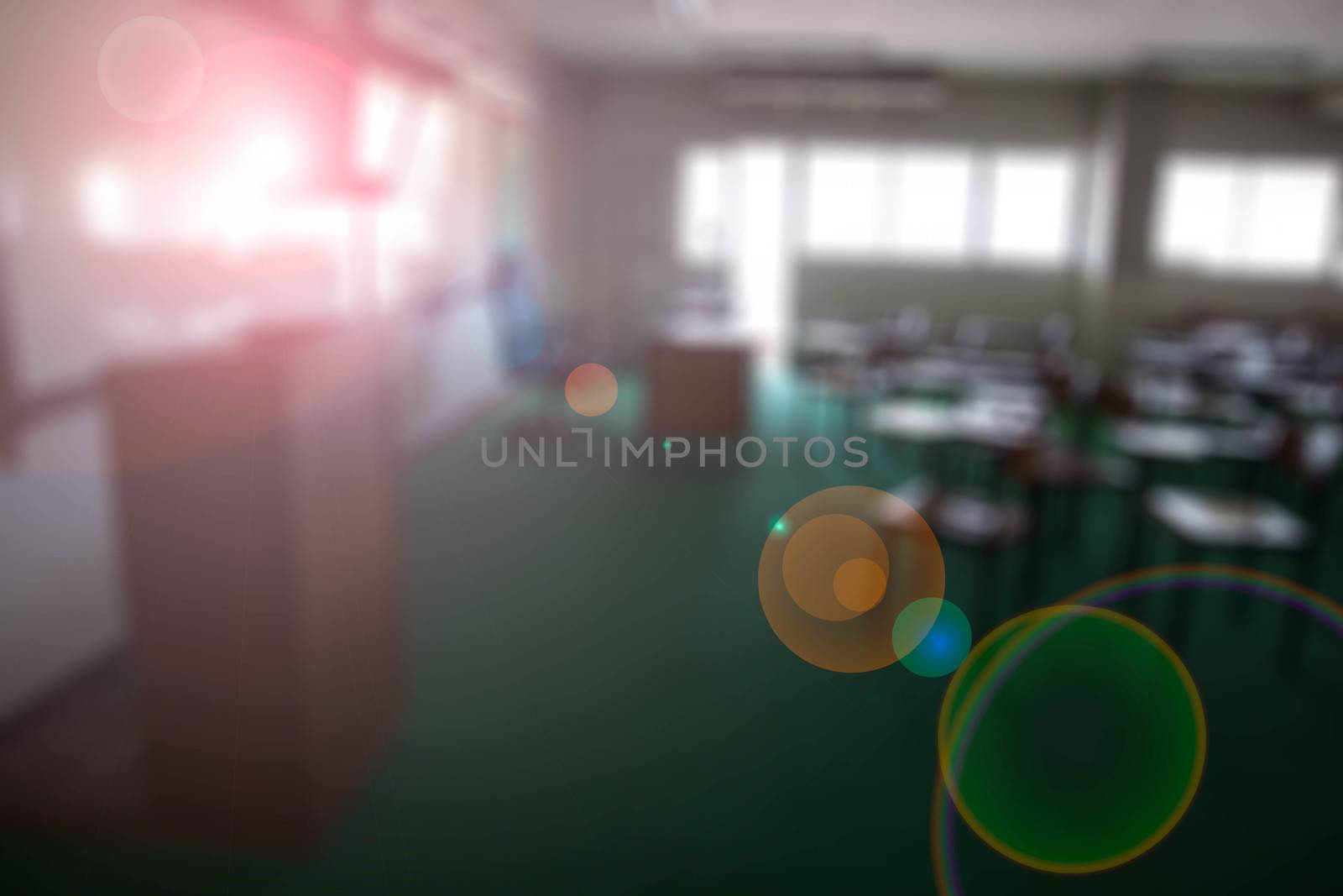 chairs in the big classroom blurred Lens flare background by primzrider