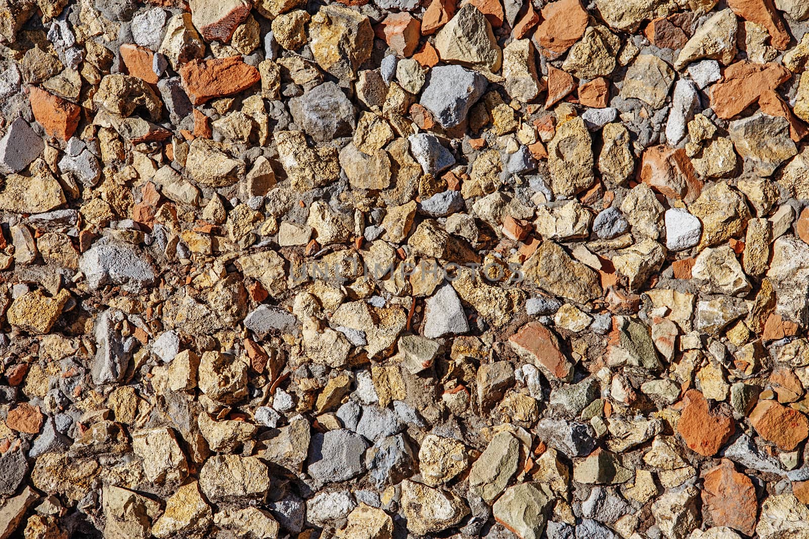 Background of chipped stones wall texture photo