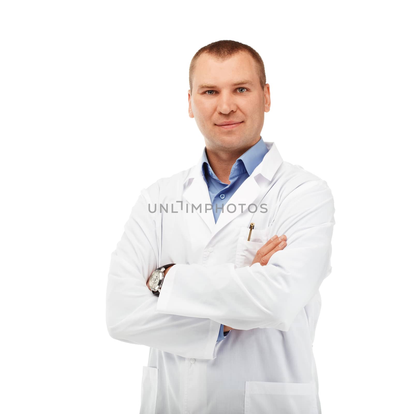 Portrait of a young male doctor in a white coat against a white background