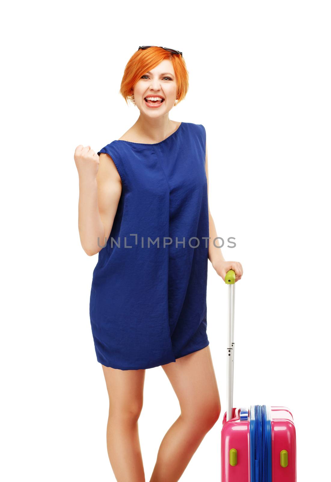 portrait of a young woman standing with a pink Luggage Trolley Bag Suitcase against white background. Yes, finally vacation! Positive emotions, holiday time, holiday season