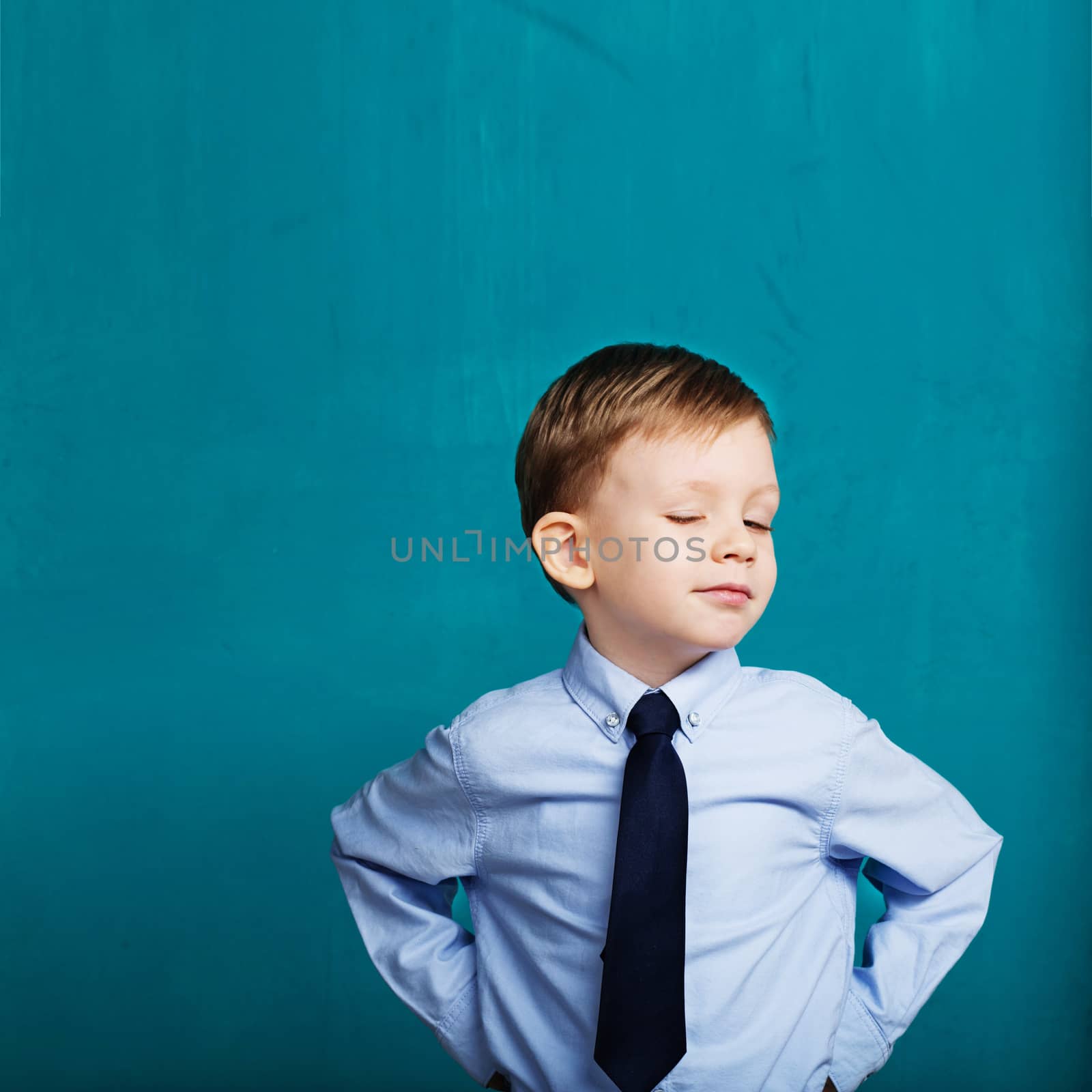 Portrait of a little boy winking and blinking