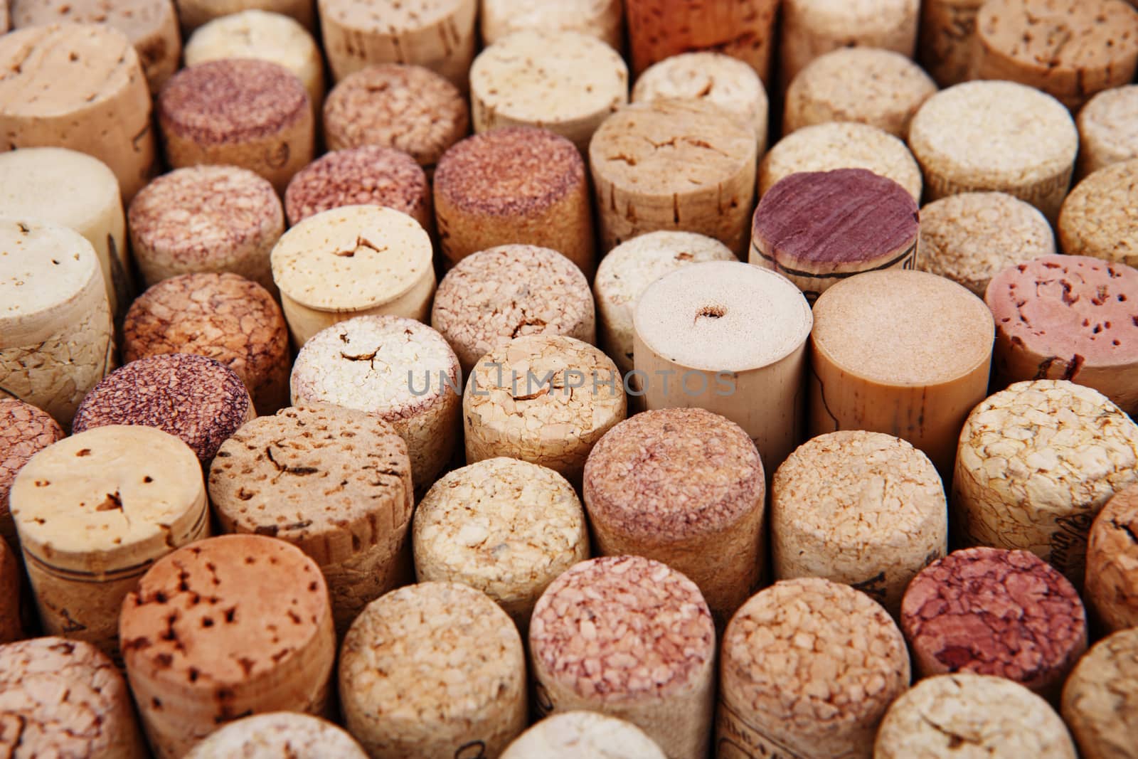 Closeup of a wall of used wine corks. A random selection of used wine corks