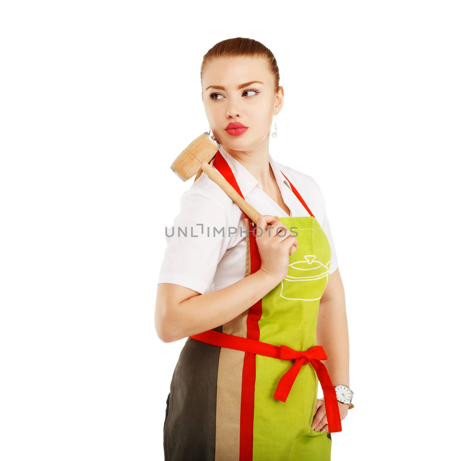 Angry housewife with a meat hammer in her hands. Sexy housewife or baker chef wearing kitchen apron holds meat hammer isolated on white background