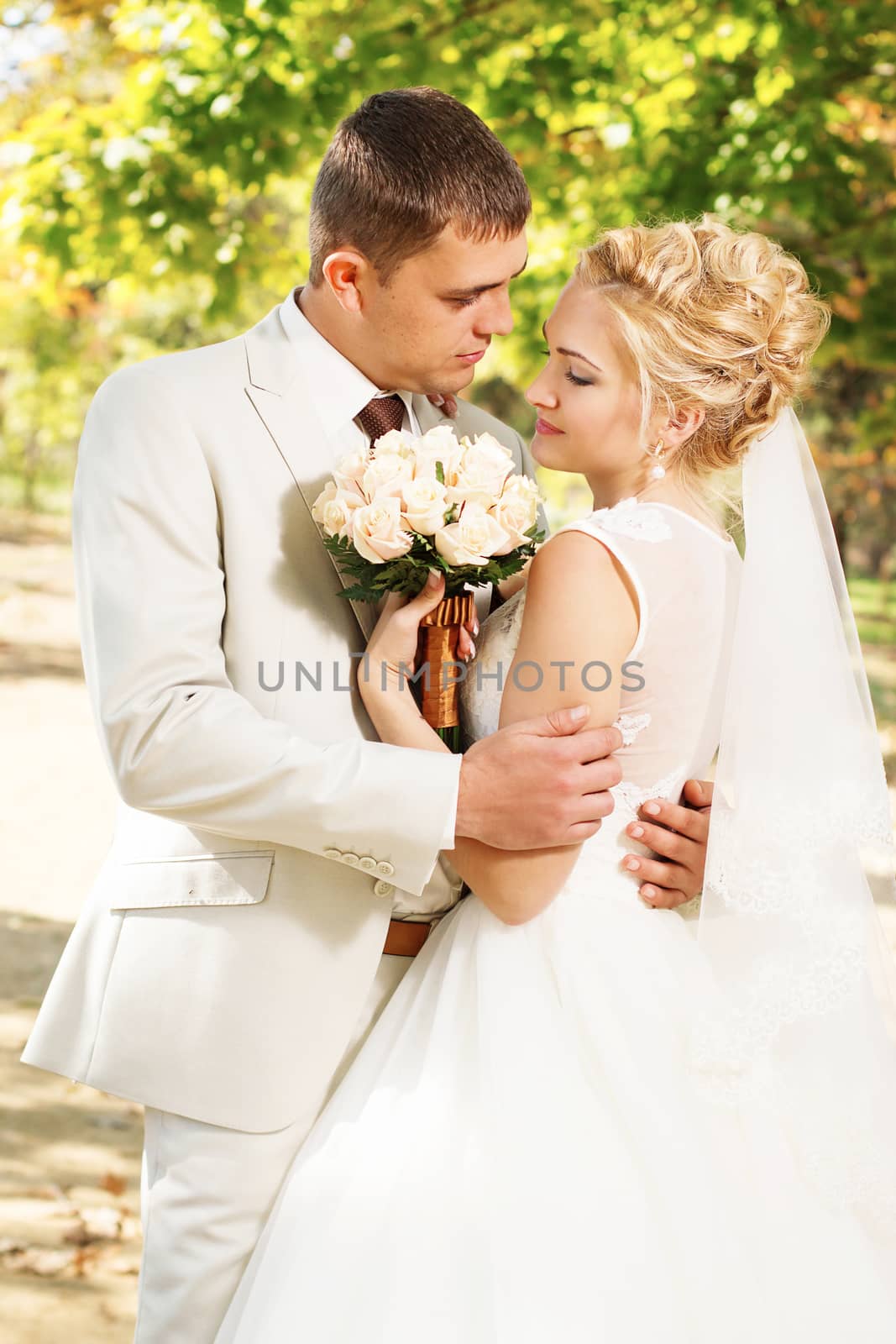 Beautiful young bride and groom in love. Wedding concept
