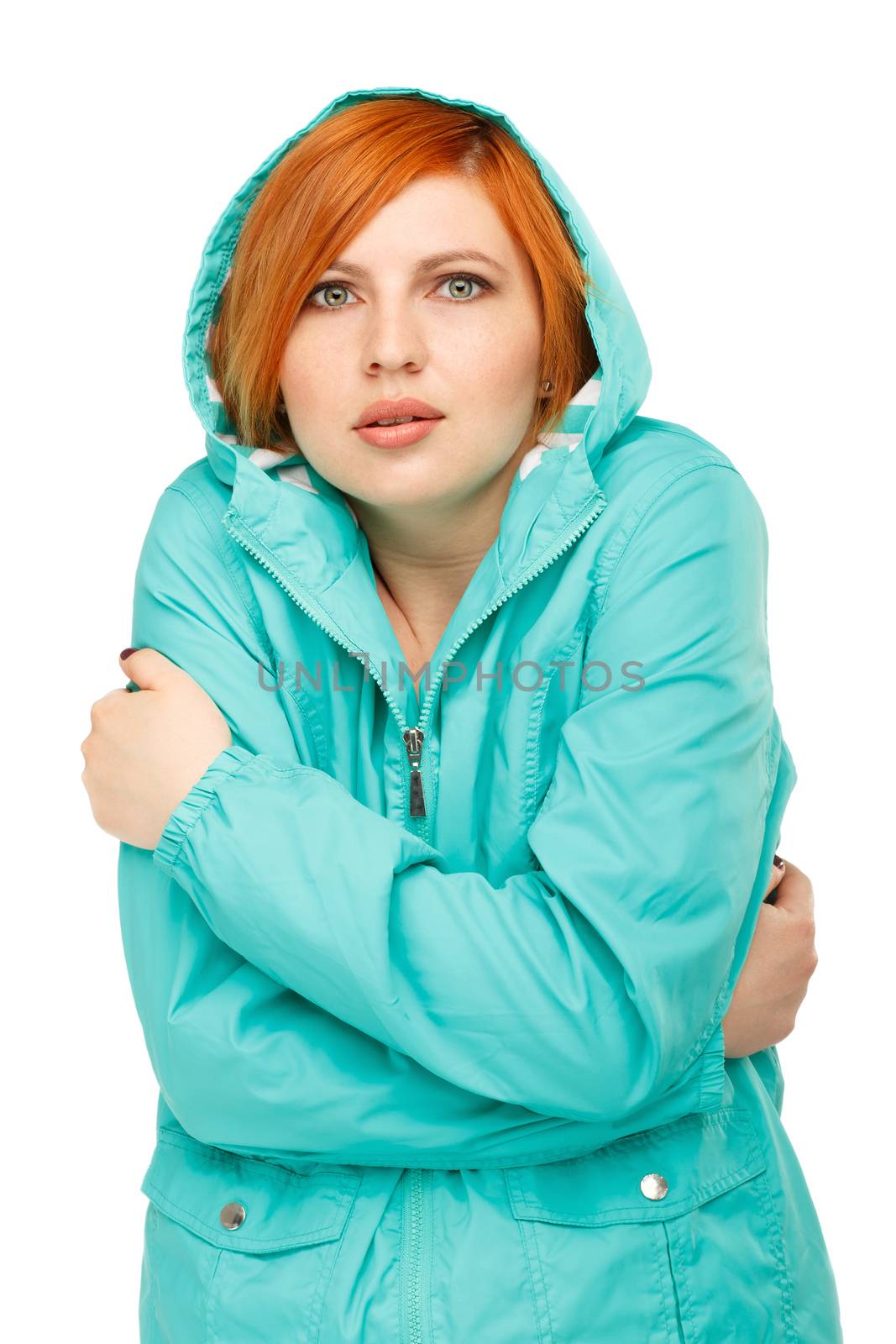 portrait of a girl in a jacket with a trembling from the cold Isolated on white background