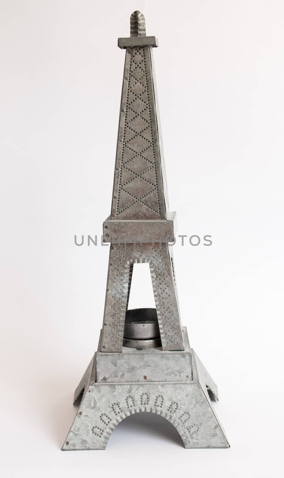 Model Eiffel Tower zinc white background. by N_u_T